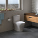 TOTO - Aquia IV, Tow piece Elongated Dual Flush Universal Height Skirted Toilet With Soft Close Seat ** PICK UP IN STORE ONLY ** - Construction Commodities Supply Inc.