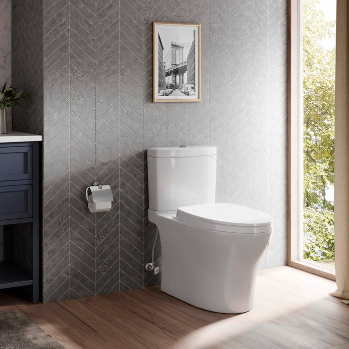 TOTO - Aquia IV, Tow piece Elongated Dual Flush Universal Height Skirted Toilet With Soft Close Seat ** PICK UP IN STORE ONLY ** - Construction Commodities Supply Inc.